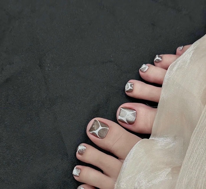 ảnh nail chân mắt mèo cuốn