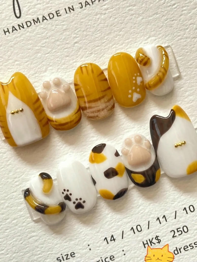 nail con mèo vàng