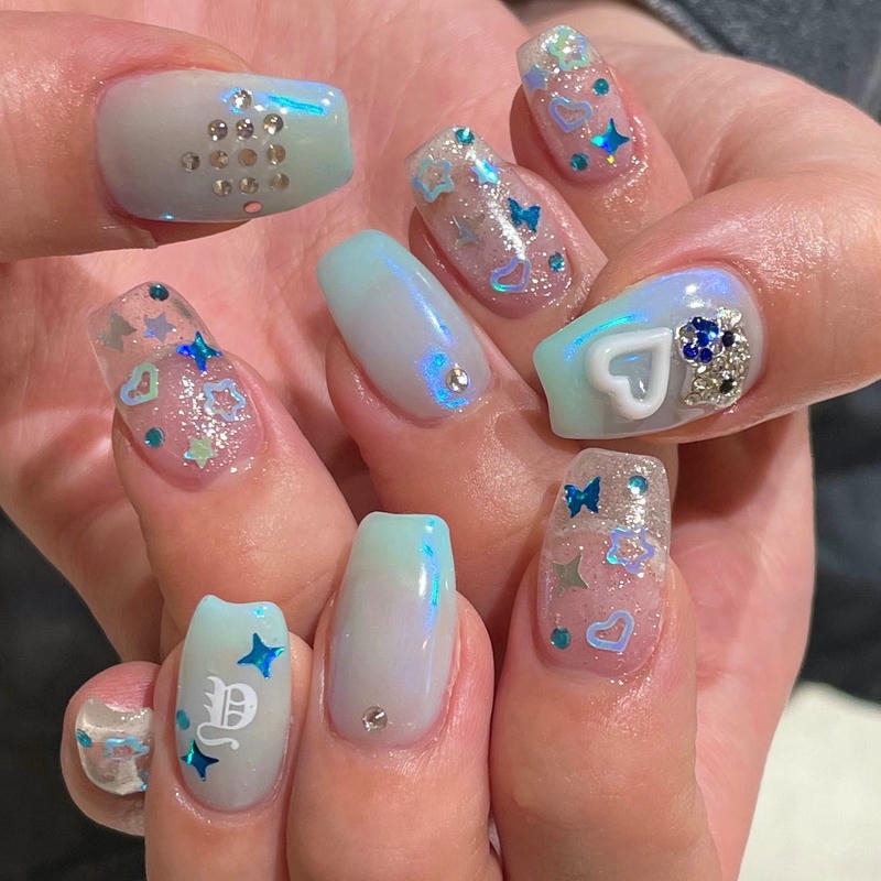 nail màu xanh ngọc nhiều họa tiết